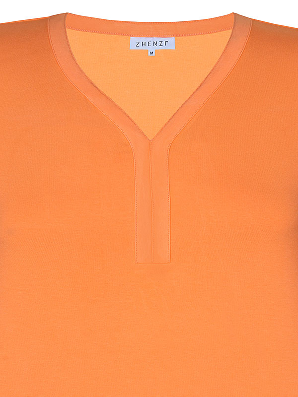 KACEY - Orange jersey top med V-hals fra Zhenzi