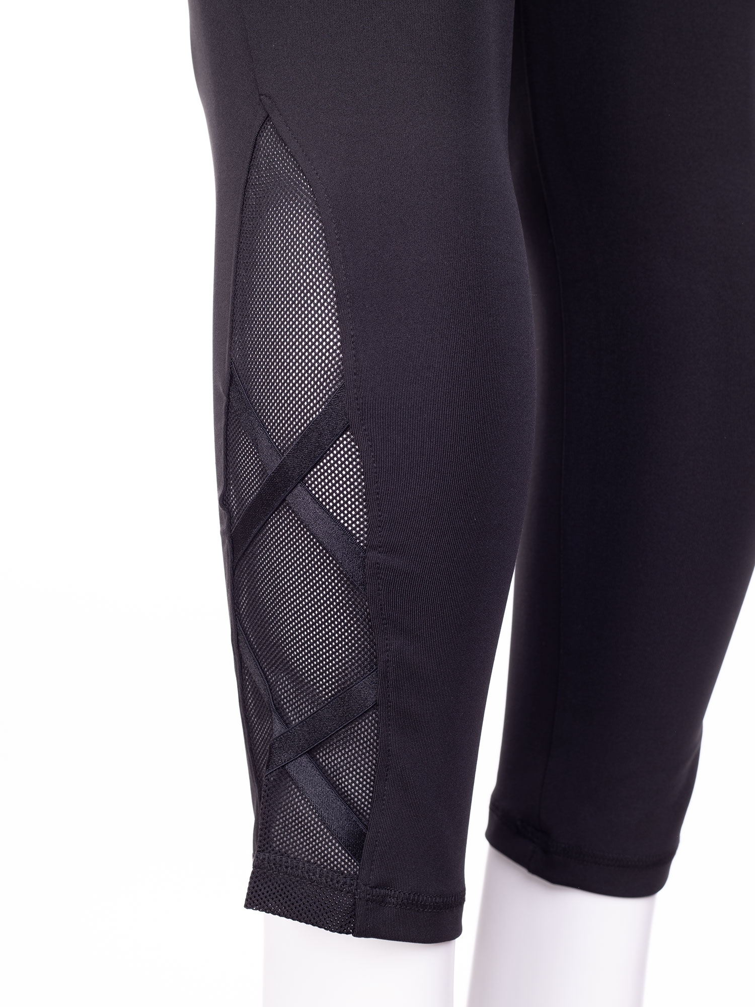 Sorte capri træningsbukser med mesh detalje fra Aprico Sport