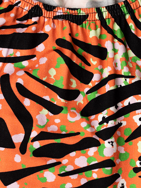 MONICA - Orange jersey kjole med print fra Gozzip