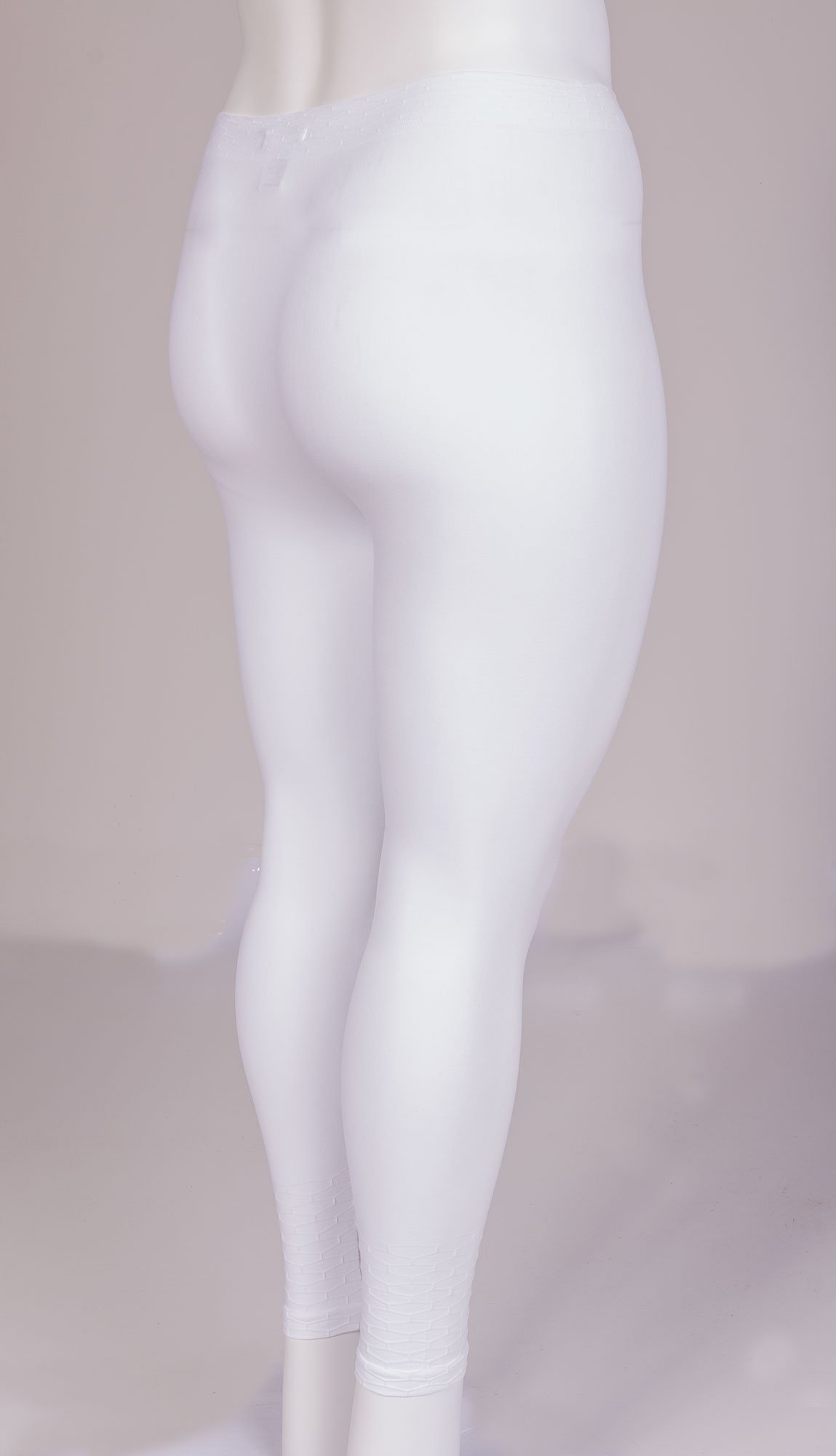 Hvide leggings med flot mønster ved ben og talje fra Gozzip