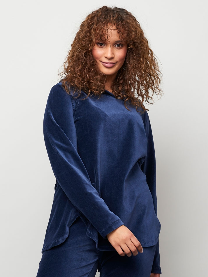 Blå tunika med mönster och volang