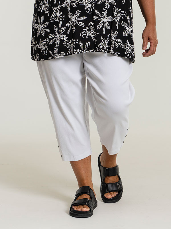 JAZZY - Hvide capri bukser med lynlås detalje
