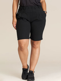 Klassiske sorte capri bukser med rummelig facon